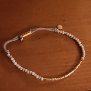 Elegant Gold and White Beaded Bracelet